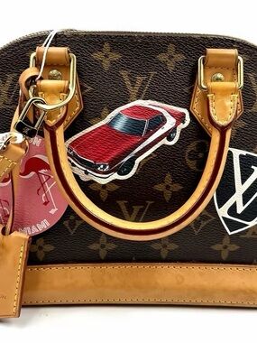 Louis Vuitton Brown Monogram Top-Handle Bag with Red Car Patch